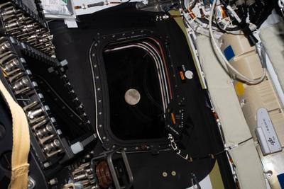 Moon through the Orion window with hardware in frame